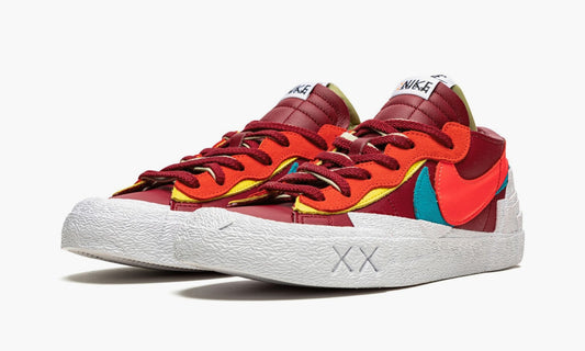 Nike Sacai Blazer Low “KAWS Red” - DM7901 600 | Grailshop